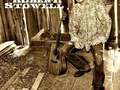 Robert Stowell country artist portrait with acoustic guitar